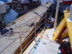 Josh finishing the install of the new starboard-aft railings
