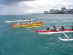 And is joined by some escort canoes
