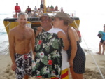 Mike & Deb give him nice Aloha shirt (looks like Deb's tryin' to sneak a kiss too,...HAHAHAHAHAHA!!)